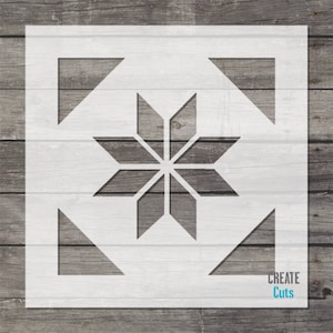 May include: White stencil with a geometric starburst design. The stencil is on a wood background. The text "CREATE Cuts" is in the bottom right corner.