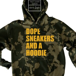 May include: Green tie-dye hoodie with the text "Dope Sneakers and a Hoodie" in yellow.