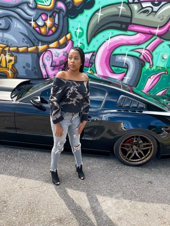 off the shoulder distressed sweatshirt