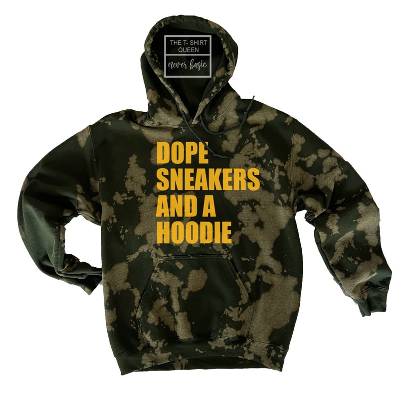 May include: Green tie-dye hoodie with the text "Dope Sneakers and a Hoodie" in yellow.