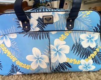 Vintage Roxy Duffel bag style rolling suitcase.