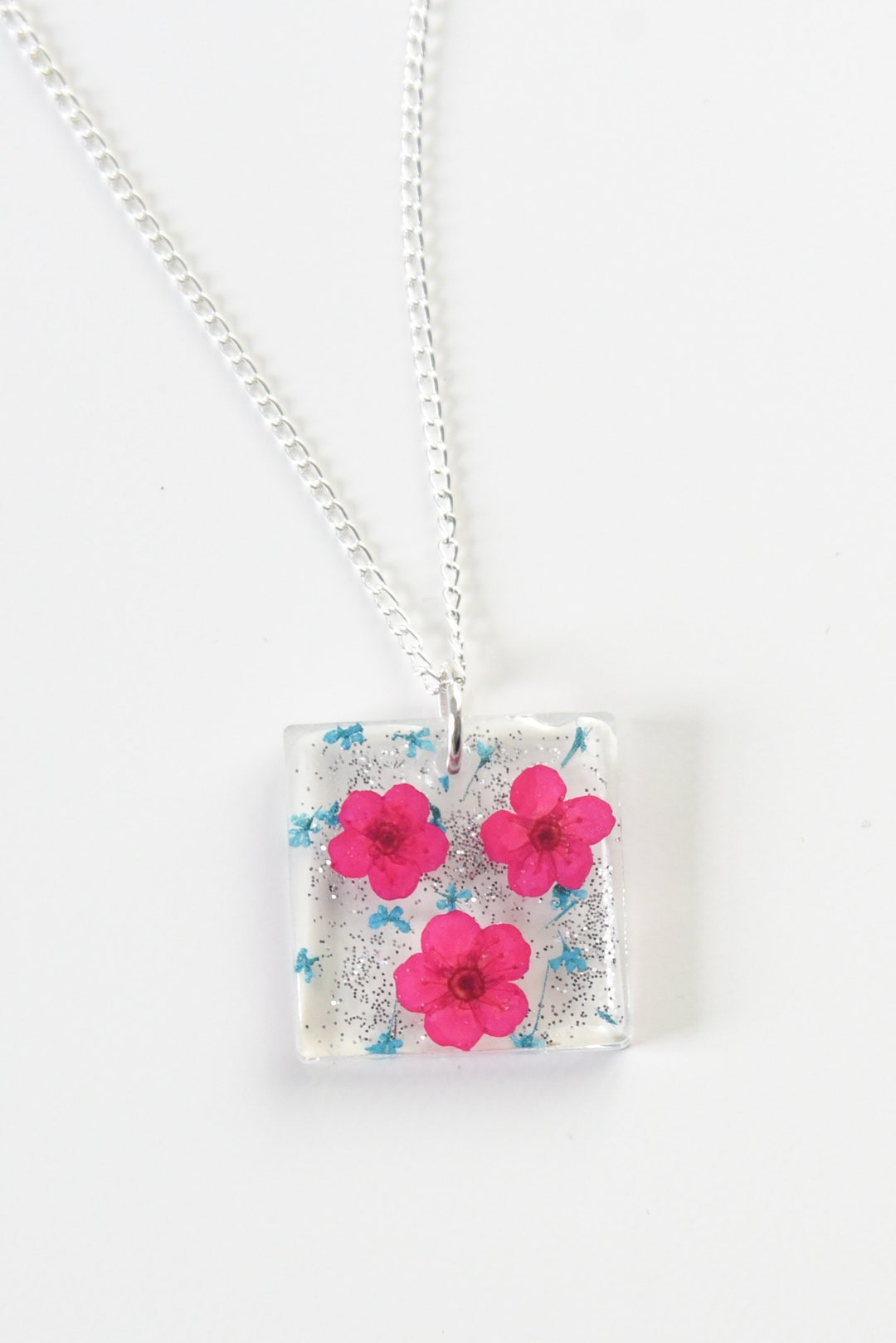 DIY Floating Glitter Necklace - Use Glitter & Resin to Make This!