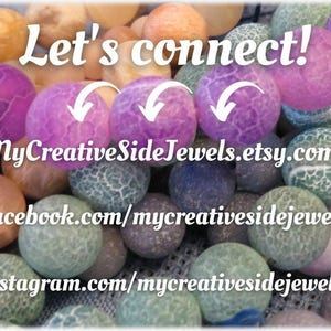 May include: A collection of round, crackle-textured beads in shades of purple, blue, green, and orange. White text overlays the image reading Let's connect! MyCreativeSideJewels.etsy.com, facebook.com/mycreativesidejewels, and instagram.com/mycreativesidejewels.