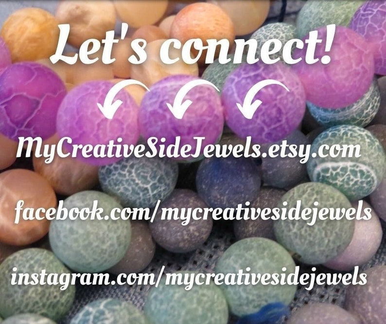 May include: A close-up image of a variety of agate beads in various colours, including purple, green, blue, and brown. The beads are arranged in a random pattern and have a natural, polished finish. The image includes the text "Let's connect!" and the website address "MyCreativeSideJewels.etsy.com".