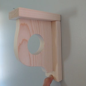 Shelf Supports With Rod Holder