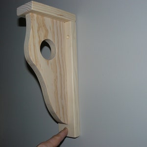 Elegant Shelf Bracket with Rod Holder