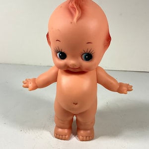 Vintage 7 1/2&quot; Kewpie Doll with Green Wings.