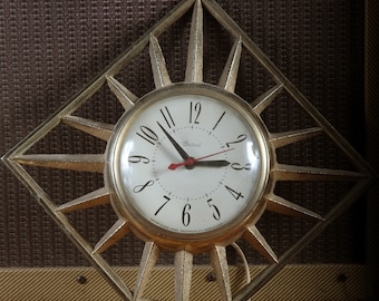 Vintage Mid Century Atomic Starburst Wall Clock Electric Gold Tone by the United Clock Company