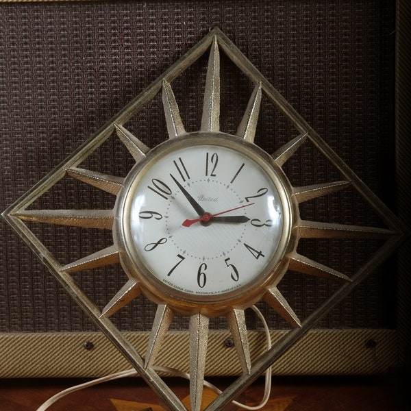 Vintage Mid Century Atomic Starburst Wanduhr Electric Gold Tone by the United Clock Company