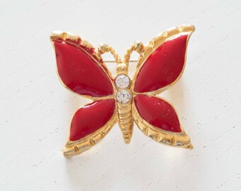 Vintage 80s goldtone and red enamel butterfly brooch