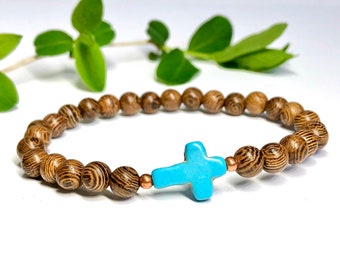 Pulsera de cruz turquesa de madera de wengué con detalles en cobre, estilo bohemio