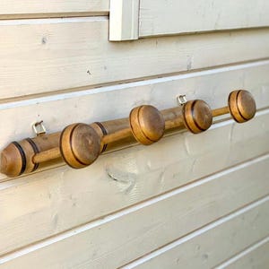 French vintage faux bamboo wood hat/coat pegs, 4 bobbin hooks, clothes hanging rack, honey patina, Paris bistro style, heavy quality France