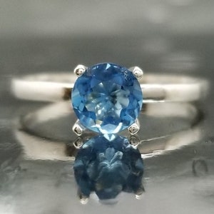 Blue Tanzanite Silver Solitaire Engagement Ring