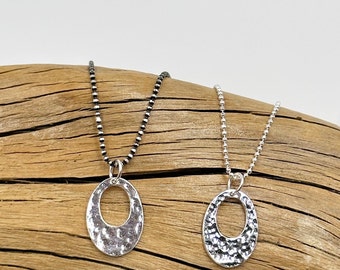 The Elizabeth Necklace - Hammered oval shaped pendant with a peak-a-boo hole Sterling Silver Necklace