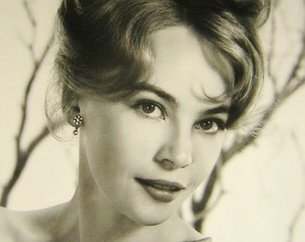 Postcard Type Publicity Photograph of the French Born International Film Star Leslie Caron.