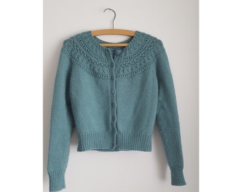 Knitting pattern for - Marble Hill, a pretty, long-sleeved cardigan with textured yoke knitted in a wool/cashmere DK yarn