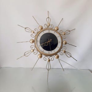 Orfac Sunburst wall clock | MCM clock | 1960s clock sun, moon, star | Midcentury modern clock