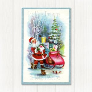 Kerstman vult zijn slee met cadeautjes Kerstafbeelding #218 Digitale download