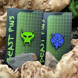 Maximal and Predacon Enamel Pins