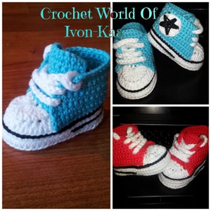May include: Crochet baby booties designed as high-top sneakers in bright blue and red colors with white laces, white toe caps, and black trim details. The text Crochet World Of Ivon-Kaa is visible at the top of the image, featuring these handmade shoes.