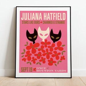 May include: Pink concert poster with a black and white cat illustration. The poster advertises a Juliana Hatfield concert on September 19th at Boynton Yards. The text reads "Juliana Hatfield, Stars Like Ours, Charmed & Strange, Sept 19, Once at Boynton Yards."