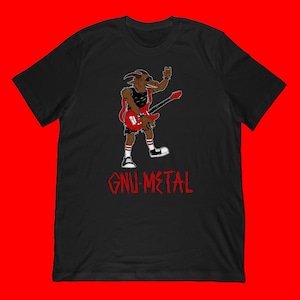 May include: Black t-shirt with a cartoon goat playing a red electric guitar and giving the rock on hand gesture. The text "GNU-METAL" is printed in red below the goat illustration.
