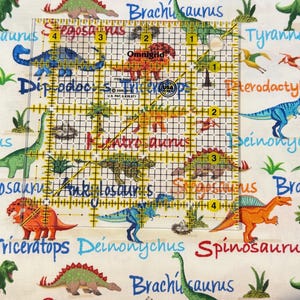 Mini Dinosaurs and Names on Cream Cotton Fabric by Timeless Treasures ...