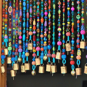 Handmade Beaded Curtain: Eclectic Boho Home Decor with Brass Bells