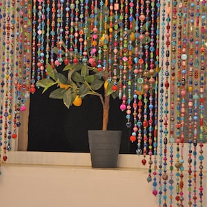 Artistic Beaded Doorway Curtain: Turquoise, Pink, Gold Arch