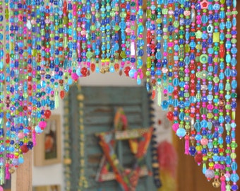 unique home decorArch-Shaped Glass-Beaded Valance in Shadows of turquoise blue green purple red and fuchsia