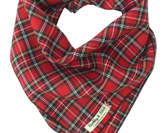 May include: Red and black plaid bandana with a black border and a white label that says "Barkley & Fitch Canine Outfitters".