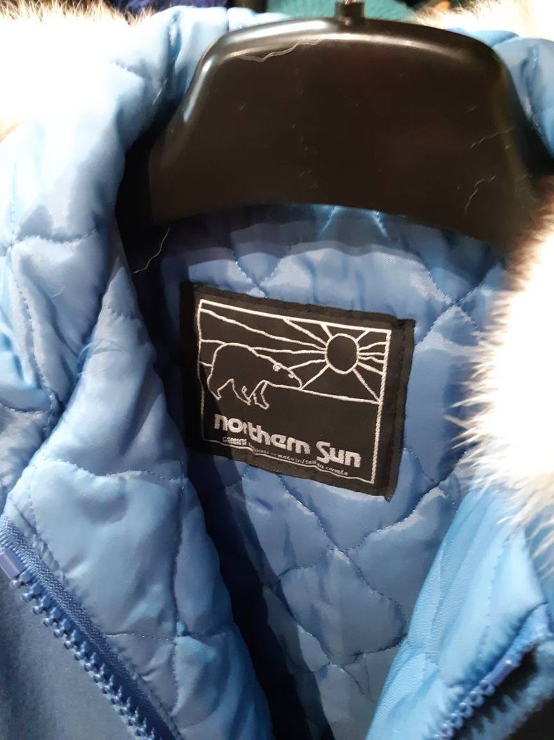 Made in Canada. Vintage Northern Sun point blanket wool parka with genuine silver tipped white fox fur trim and embroidered duck motifs