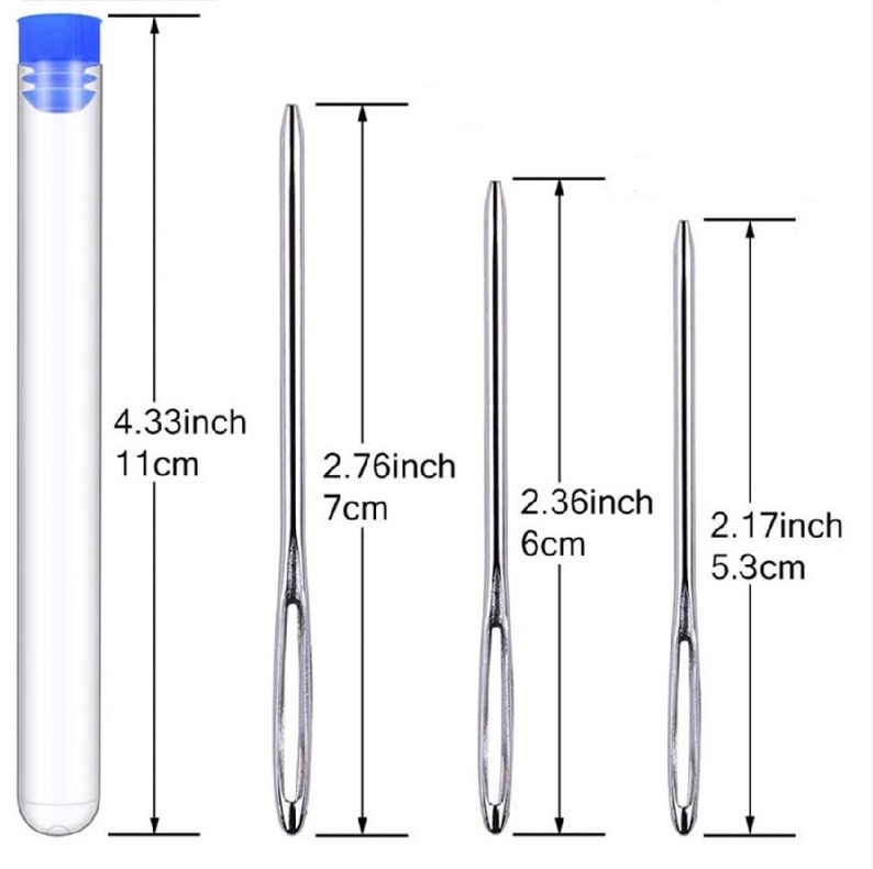 May include: Four different sizes of silver needles with measurements in inches and centimeters. The needles are in a clear plastic tube with a blue lid.