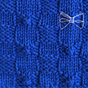 May include: A close-up of a blue knitted fabric with a diamond pattern. The fabric is soft and textured.