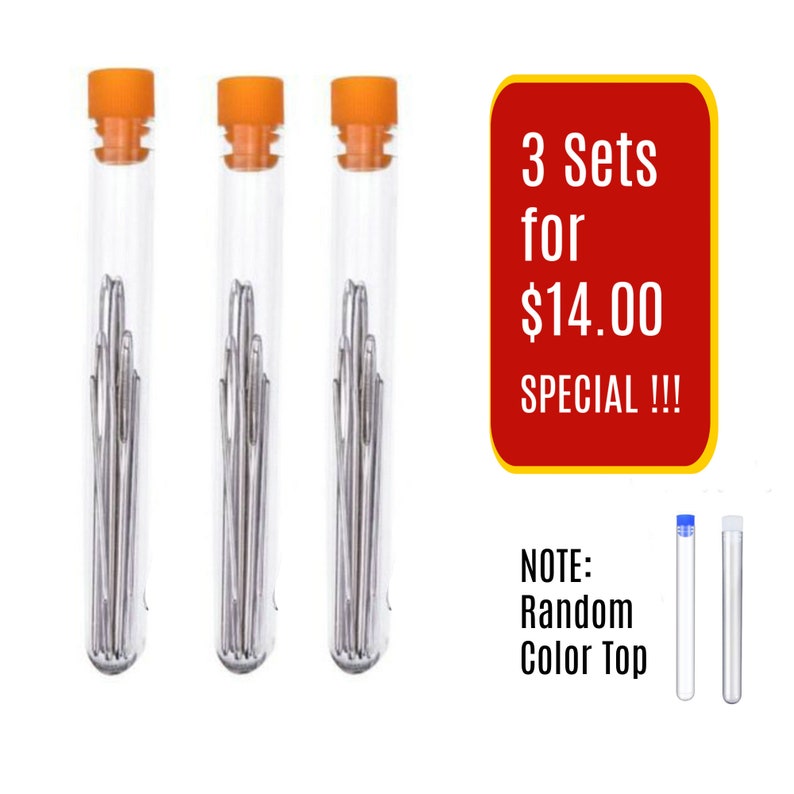 May include: Three sets of clear plastic tubes with orange tops, each containing a bundle of silver sewing needles. The text "3 Sets for $14.00 SPECIAL!!!" is in a red box. The text "NOTE: Random Color Top" is below the red box. Two clear plastic tubes with different colored tops are shown below the text.