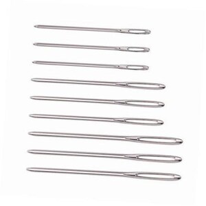 May include: A set of ten silver sewing needles of varying sizes.