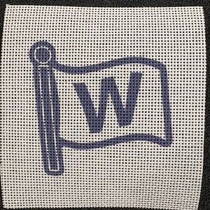 May include: A square needlepoint canvas with a white background and a navy blue flag design. The flag features the letter "W" in the center. The canvas is made of a grid-like material.
