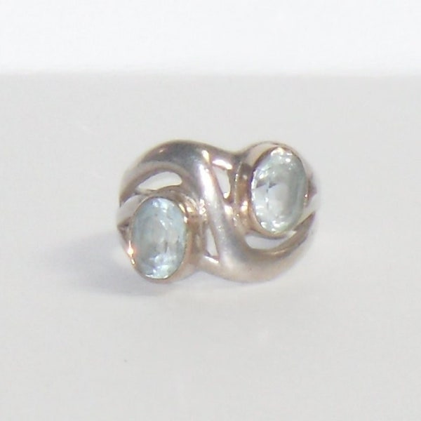 Sterling Silver Naja Ring with Light Blue Stones