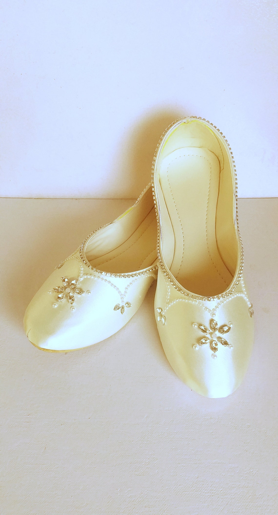 ivory pointed flats