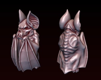 May include: A small, detailed, skeletal bat figurine with a pink, fleshy color. The bat is posed with its wings spread out, and its head is tilted down. The figurine is made of a smooth, glossy material.