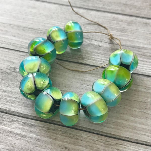 2+ pcs Turquoise green handmade glass beads