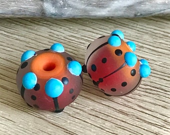 2 pcs + Blue orange  red black  handmade lampwork glass beads about 17 mm