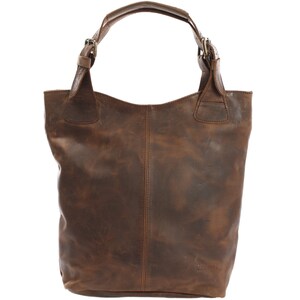 May include: A brown leather tote bag with two buckle straps. The bag has a distressed look and a slightly slouched shape.