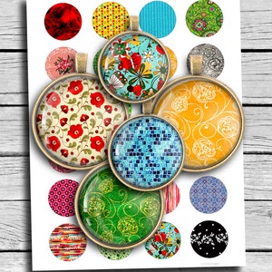 May include: Assortment of 1.5 inch round glass cabochons with various colorful patterns, including floral, geometric, and abstract designs. The cabochons are set in silver-toned metal settings with a loop for hanging.