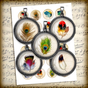 May include: Twelve round, silver-toned metal charms with a white background and colorful feather designs. The feathers are in various colors, including green, blue, red, and brown. The charms have a beaded edge and a loop for hanging.