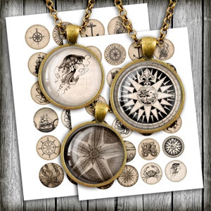 May include: Three gold-toned pendants with nautical themed images. The pendants are on a white background with a sheet of smaller round stickers with nautical images. The pendants feature a compass, a starfish, and a jellyfish.
