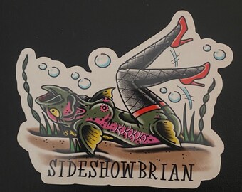 Spawned Out, vinyl reverse mermaid sticker designed by sideshowbrian tattooer