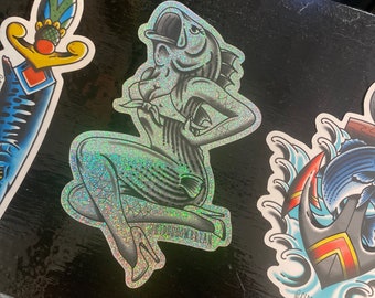 Striper stripper, crushed glitter vinyl tattoo inspired reverse mermaid striped bass fishing sticker designed by sideshowbrian tattooer