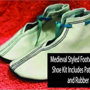 May include: A pair of off-white, medieval-styled shoes with black stitching and blue accents. The shoes are made of a soft material and have a rubber sole. The text on the image reads "Medieval Styled Footware Shoe Kit Includes Pattern and Rubber Sole."