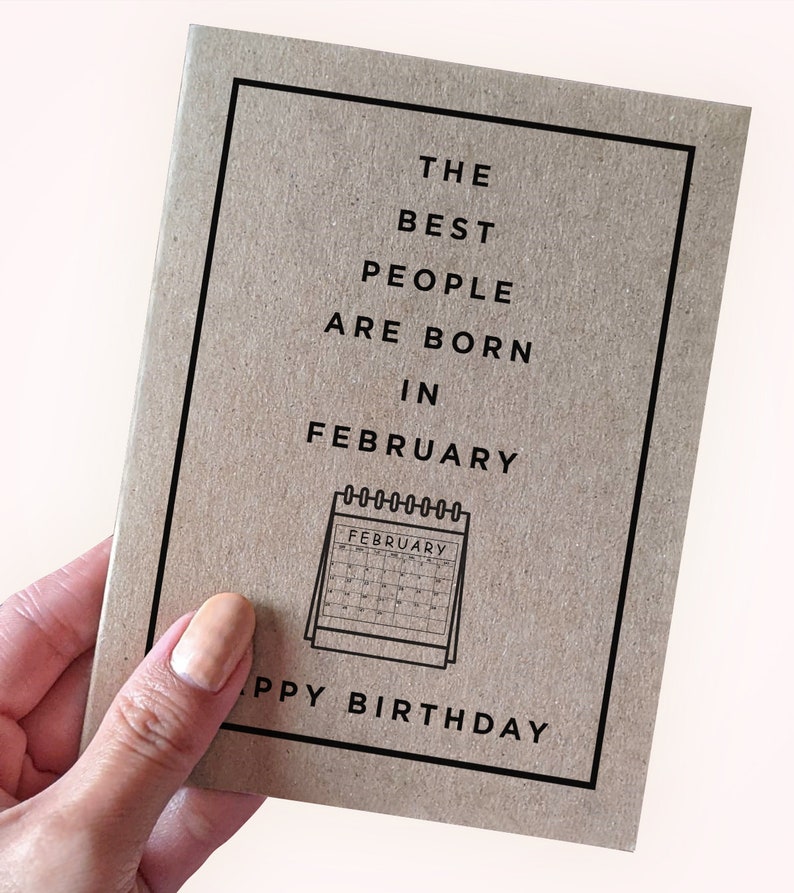 May include: A brown card with black text that reads "The best people are born in February" with a black and white calendar graphic that says "February" and a happy birthday message.
